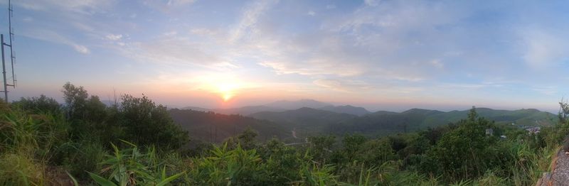 Scenic view of landscape against sky during sunset