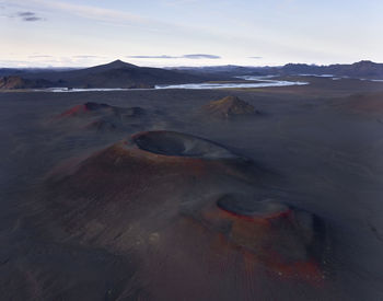 Scenic view of volcanic landscape against sky
