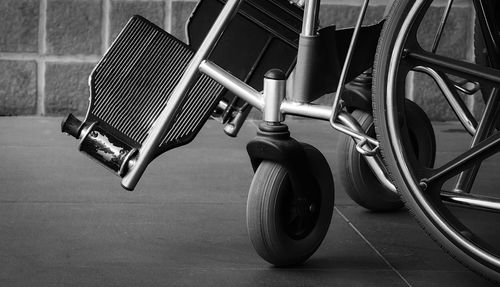 Close-up of wheelchair on floor