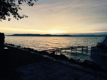 Scenic view of sea at sunset