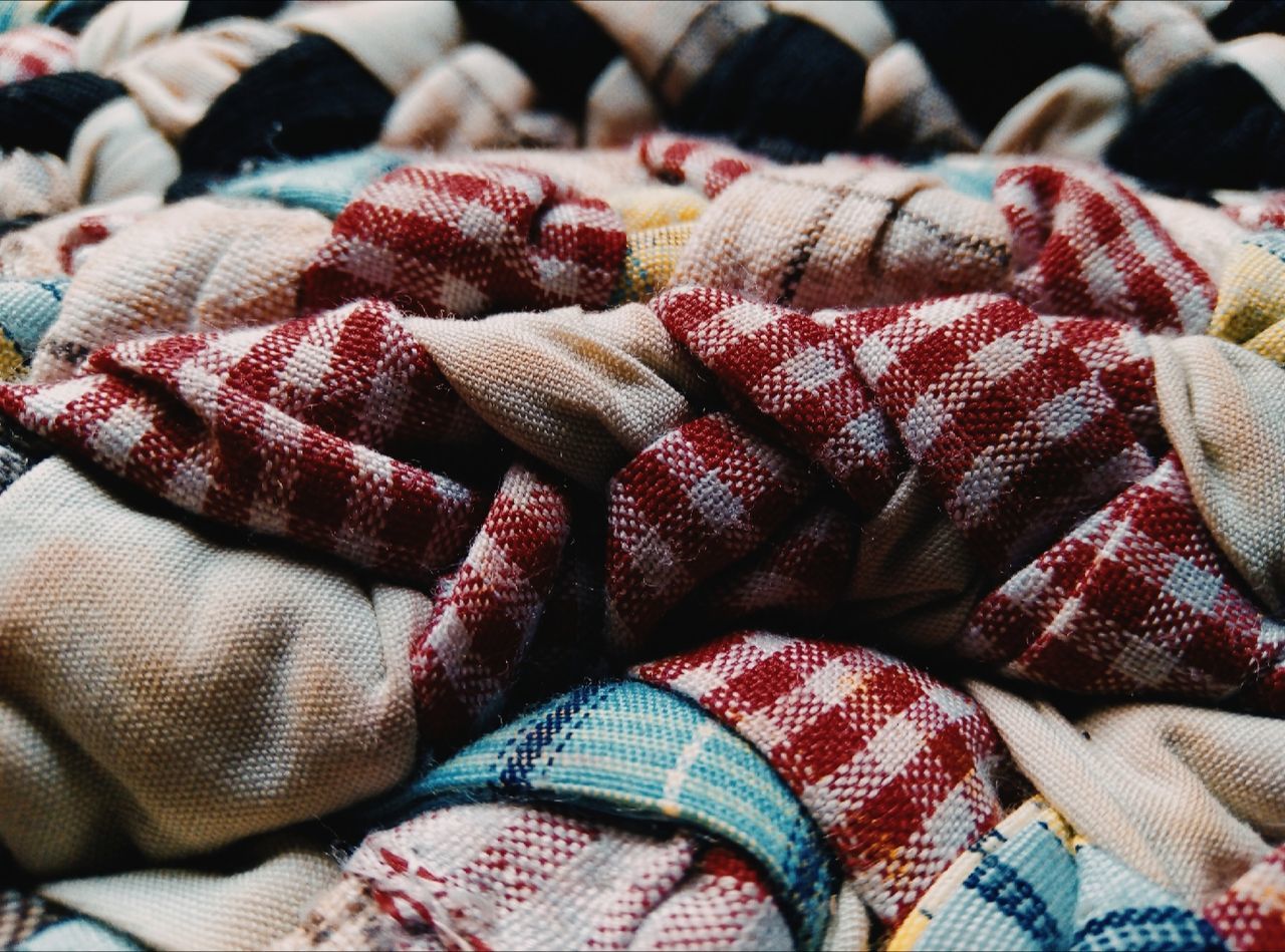 textile, no people, full frame, large group of objects, art, abundance, backgrounds, still life, blanket, variation, for sale, business finance and industry, close-up, multi colored, retail, indoors, red, market, sack, clothing, high angle view, thread, day