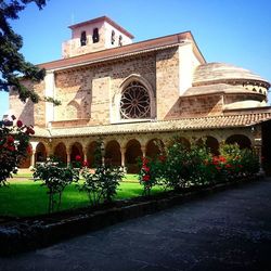 Facade of building with trees in foreground