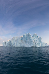 Scenic view of frozen sea against sky