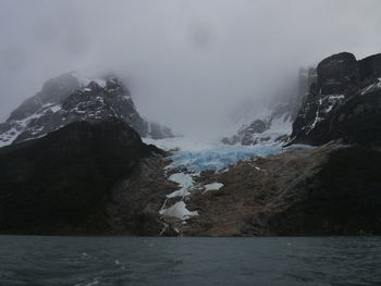 Scenic view of sea against sky during winter