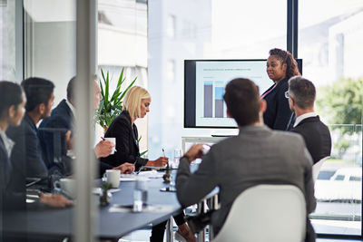 Business colleagues working in office