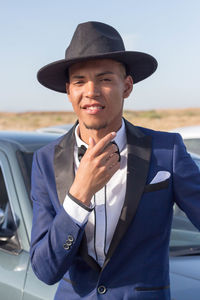 Close-up portrait of a smiling young man