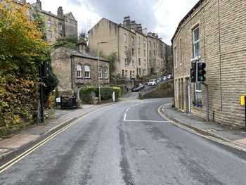 View on, keighley road, with victorian buildings, on an autumn day in, hebden bridge, yorkshire, uk