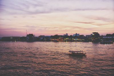 Scenic view of river against sky during sunset