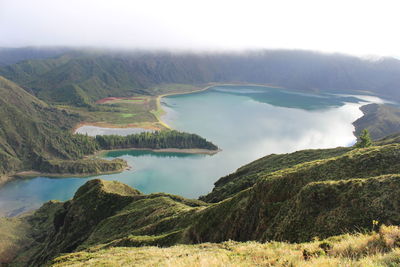 Scenic view of lake amidst mountains at sao miguel