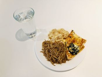 Food served on table against white background