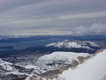 Scenic view of snow covered mountain against sky