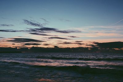 Scenic view of silhouette trees against sky at sunset