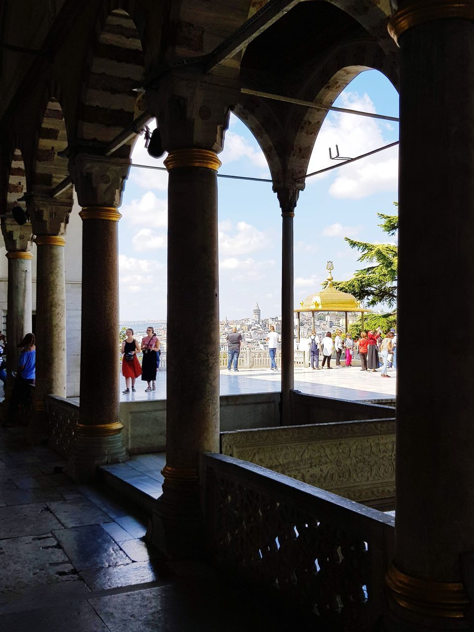 VIEW OF BUILDINGS SEEN THROUGH FROM COLONNADE