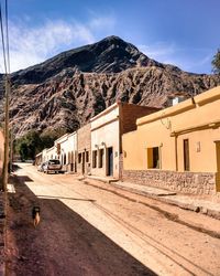 Houses with mountains in background