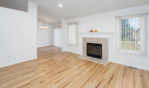 New hard wood flooring has been installed in a renovated home