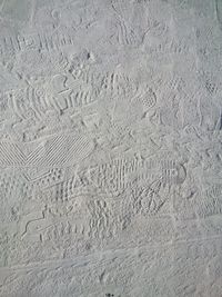 Full frame shot of text on sand at beach