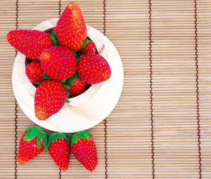 High angle view of strawberries on table