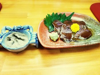 Close-up of food in plate on table