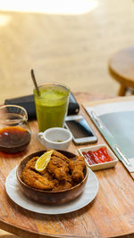 Close-up of breakfast served on table