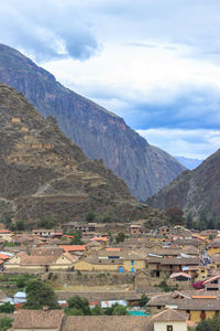 High angle view of townscape against mountain