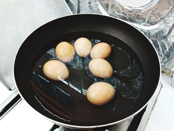 High angle view of eggs in container