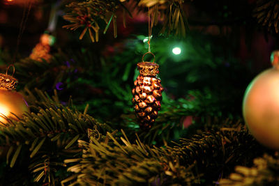Close-up of christmas decoration hanging on tree