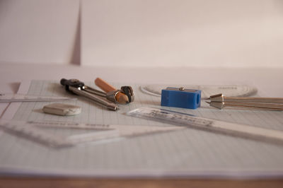 Close-up of school supplies on table