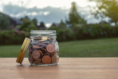 Close-up of coins on table