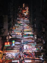 Illuminated street market at night