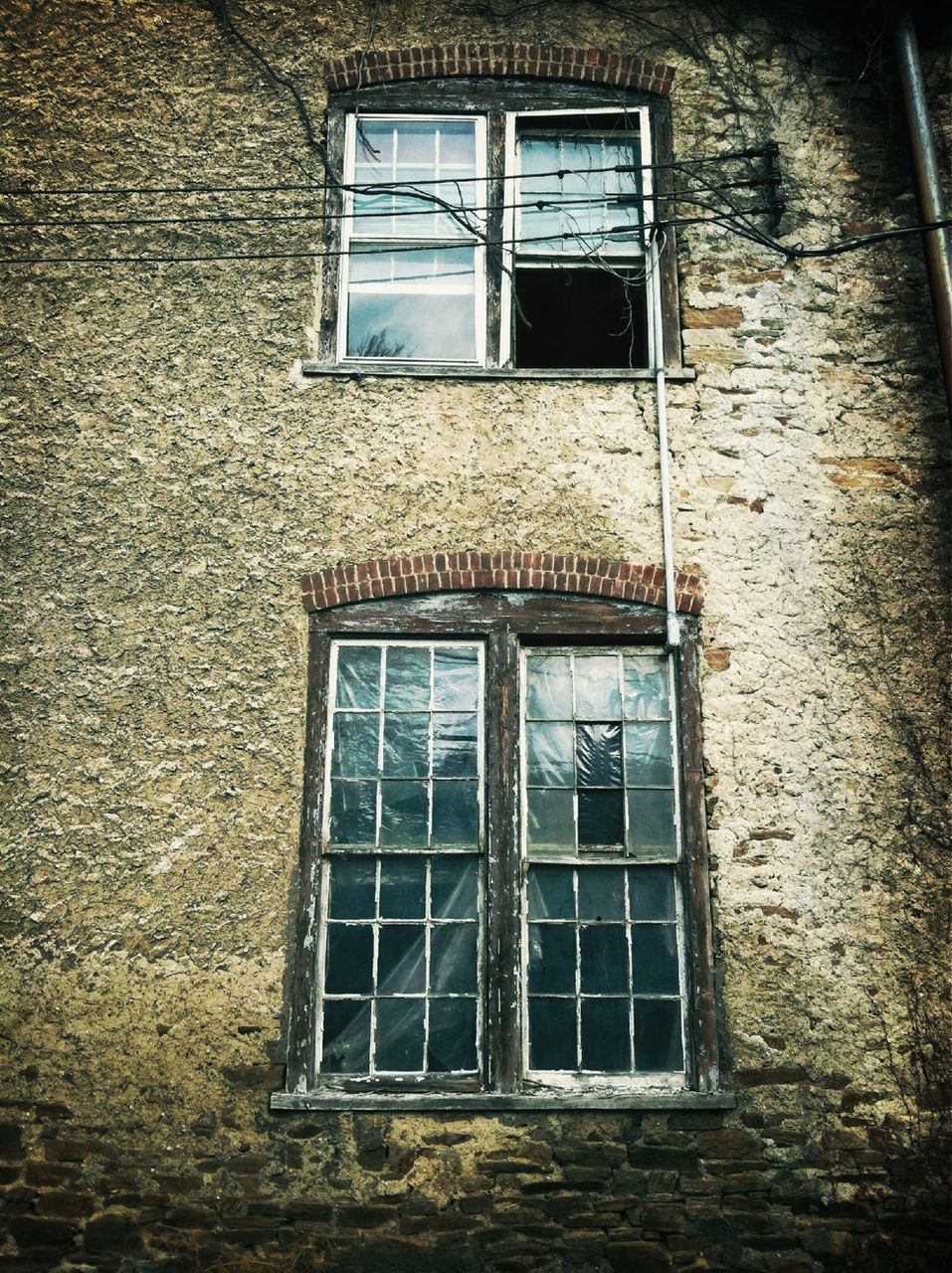 window, architecture, building exterior, built structure, house, old, residential building, residential structure, low angle view, closed, door, brick wall, glass - material, weathered, building, day, damaged, outdoors, abandoned, no people