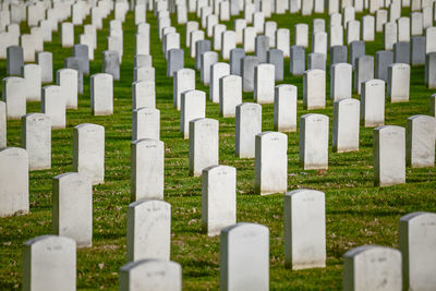 Rows of headstones at arlington national cemetery in arlington, va