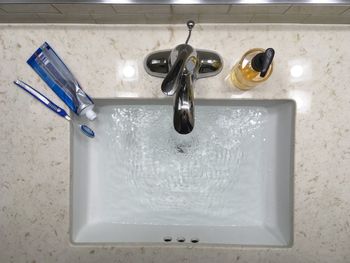 High angle view of faucet in bathroom