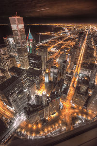 Illuminated cityscape at night