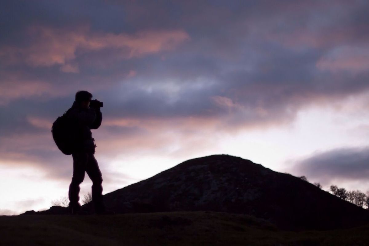 sky, cloud - sky, silhouette, mountain, standing, cloudy, lifestyles, men, leisure activity, full length, tranquility, cloud, tranquil scene, weather, scenics, nature, beauty in nature, landscape