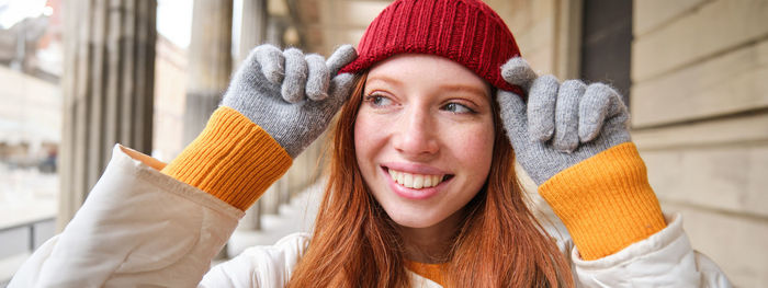 Close-up of woman wearing hat