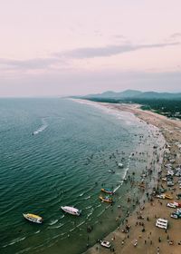 High angle view of beach against sky during sunset