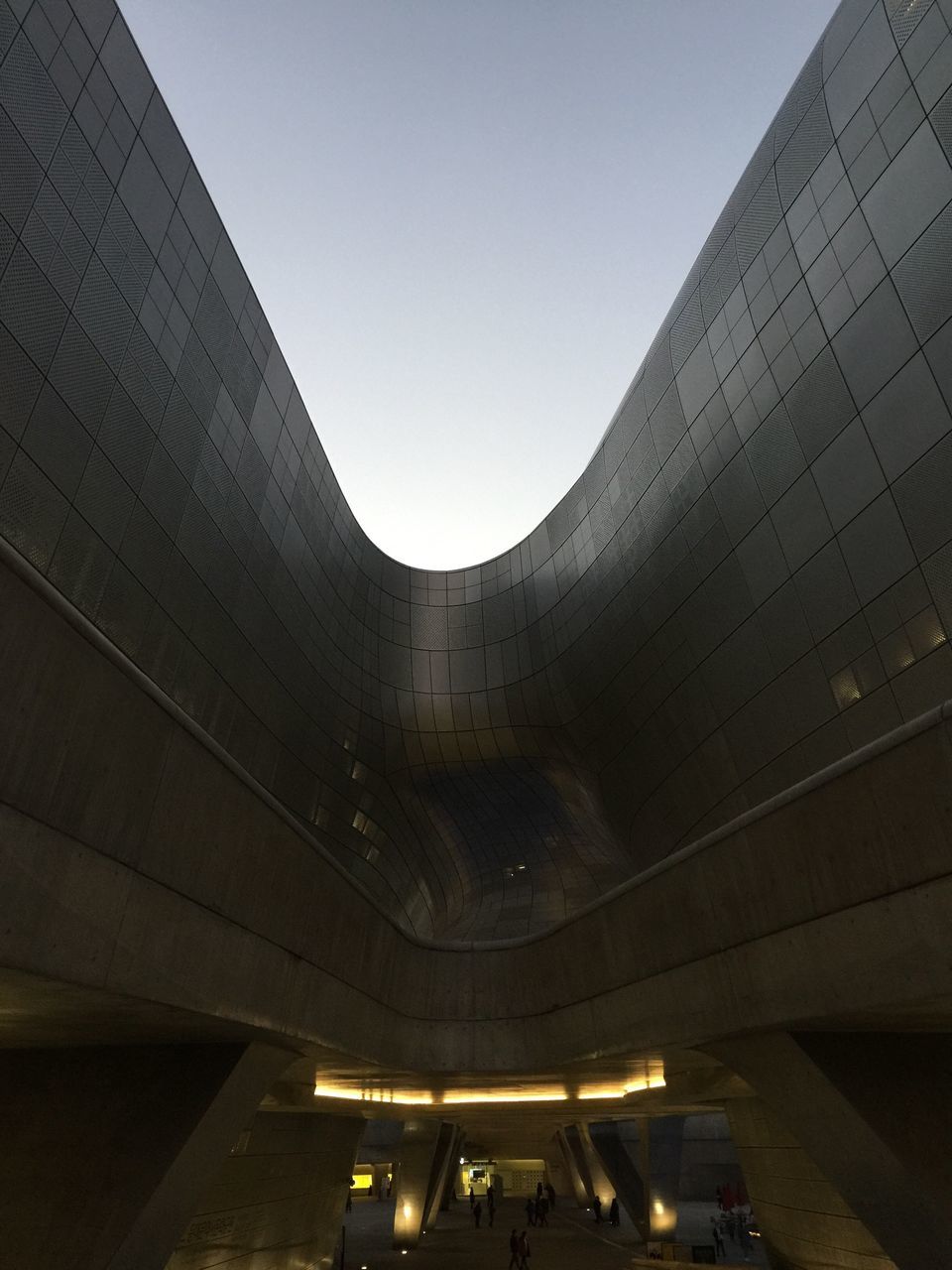 LOW ANGLE VIEW OF ILLUMINATED BUILDING