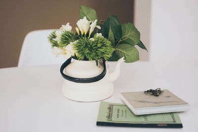 Close-up of plant on table at home