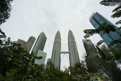 Low angle view of skyscrapers against sky