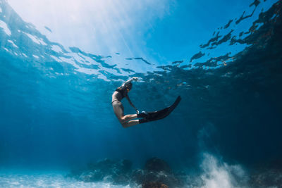 Man swimming in sea