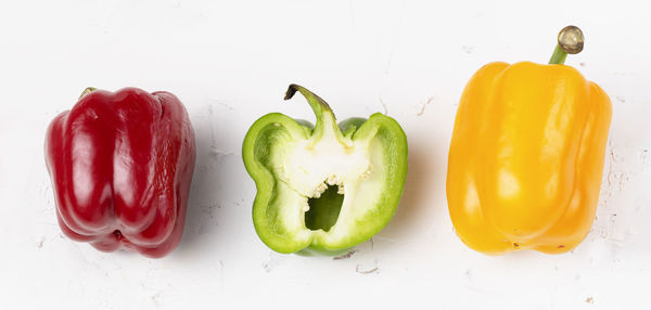 Close-up of bell peppers against white background