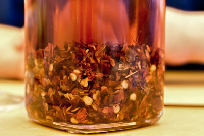 Close-up of glass jar on table