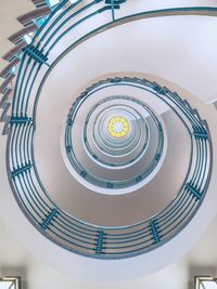 Low angle view of spiral staircase in building