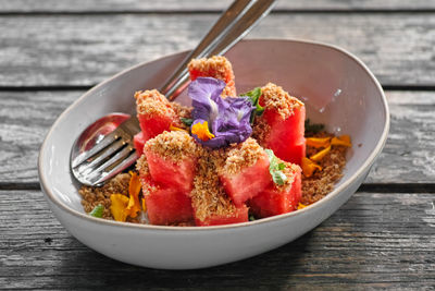 Close-up of fruits in bowl on table