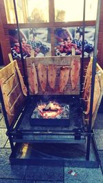 High angle view of meat on barbecue grill