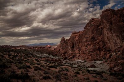 Rock formations on landscape against sky