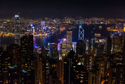 Aerial view of city lit up at night