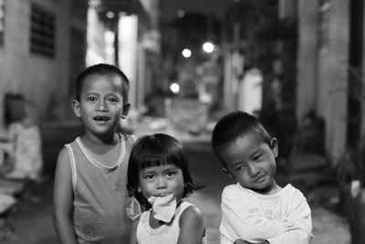 Portrait of friends against blurred background