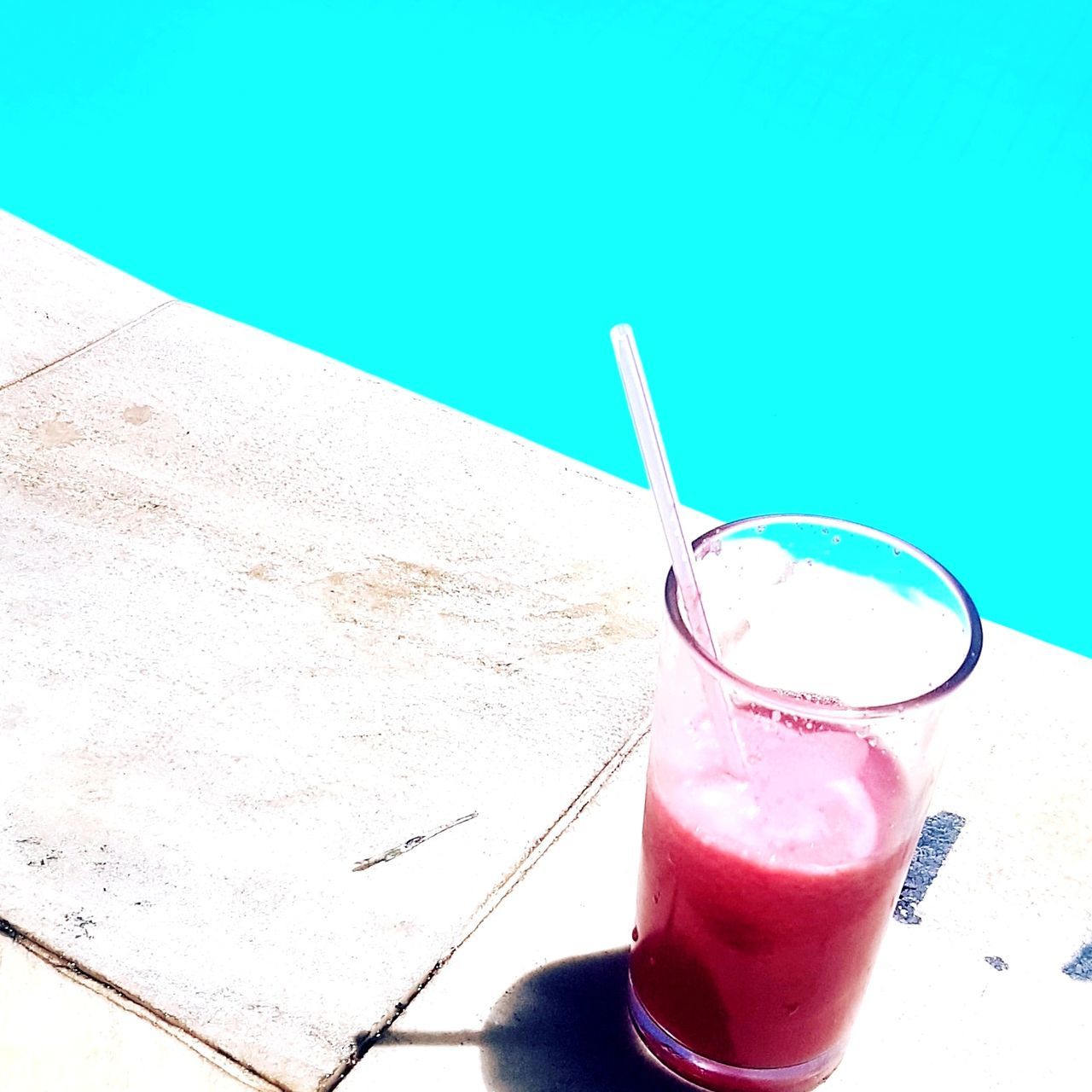 CLOSE-UP OF DRINK WITH GLASS OF JUICE