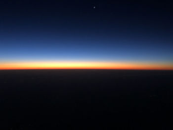 Scenic view of silhouette landscape against clear sky at sunset